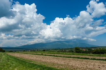 Fototapeta na wymiar Beautiful clouds over Vitosha and Plana moumtains, Bulgaria