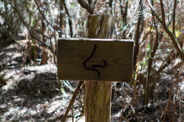 wooden sign asking to smell