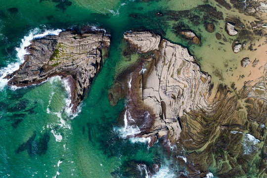 Aerial view of the rock formations at the Carreagem Beach in Aljezur, Algarve;