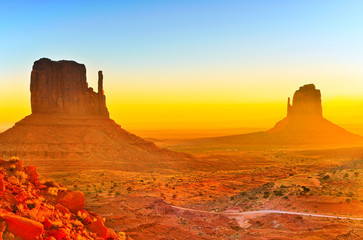 View of Monument Valley at sunrise near the border of Arizona and Utah in Navajo Nation Reservation in USA.