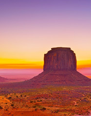 View of Monument Valley at dawn near the border of Arizona and Utah in Navajo Nation Reservation in...