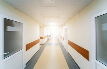Empty long corridor in the modern clinic.