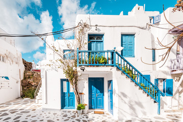 Typical Greek architecture in the white, cobbled alleys of Mykonos town, houses in the old town of...
