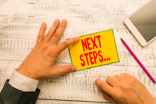 Handwriting text writing Next Steps. Conceptual photo something you do or plan after you ve finished something else