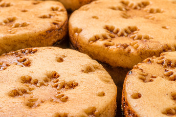closeup view christmas mini cakes on wooden board