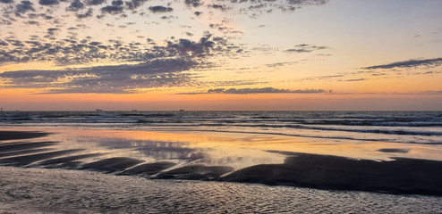 Beautiful panorama of sunset sky on the beach