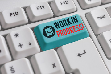 Writing note showing Work In Progress. Business concept for unfinished project that still added to...