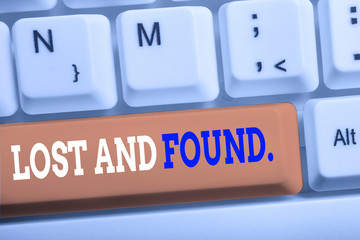 Word writing text Lost And Found. Business photo showcasing a place where lost items are stored until they reclaimed White pc keyboard with empty note paper above white background key copy space