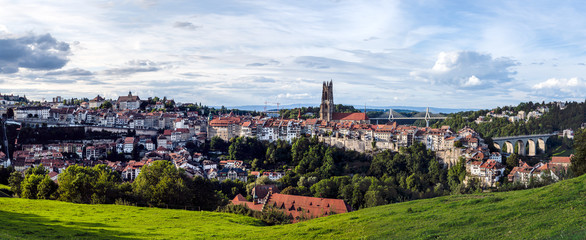 The gothic cathedral skyline of the picturesque historic walled city of Fribourg, in the French speaking part of Switzerland; Fribourg, Switzerland