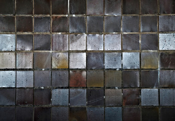 Dark opalescent ceramics tile surface with light reflections, graphic element for background and backdrop design.