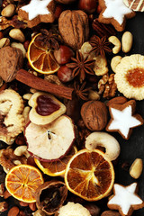 Decoration with christmas cookies. Typical cinnamon stars with fruits and nuts cinnamon