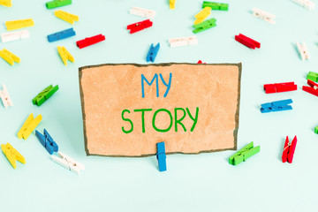 Handwriting text writing My Story. Conceptual photo the things or situations that have happened to someone in life Colored clothespin papers empty reminder blue floor background office pin
