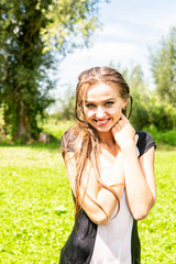 Obraz premium The young beautiful modern dancer dancing under water drops