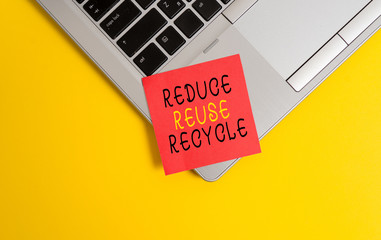 Writing note showing Reduce Reuse Recycle. Business concept for environmentallyresponsible consumer behavior Metallic trendy laptop blank sticky note empty text colored background