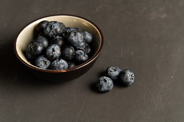 Blueberry antioxidant organic superfood in ceramic bowl concept for healthy eating and nutrition