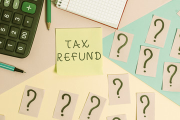 Conceptual hand writing showing Tax Refund. Concept meaning refund on tax when the tax liability is...