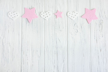Background with hearts and pink stars. Frame for sale, banner, greeting lettering. Wooden background with hearts. Valeninov birthday