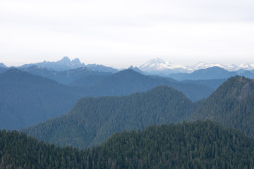 scenic panorama over the mountains of North Vancouver in summer, snow peaks, Canada, BC