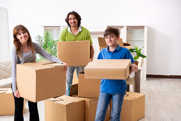 Young family moving to new flat