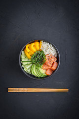 Hawaiian salmon poke bowl with seaweed