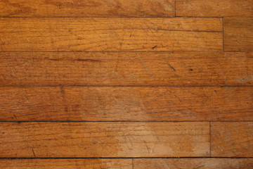 Weathered and damaged hardwood flooring, suitable for backgrounds or textures.
