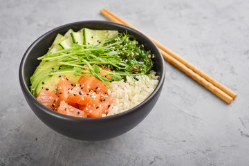 Hawaiian salmon poke bowl with seaweed