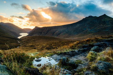 Ben Crom Reservoir in the Mourne Mountains, County Down, Northern Ireland, seen at sunset - Powered by Adobe