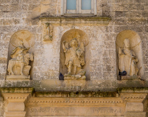 Statues on the Church of the Purgatory in Matera, Italy