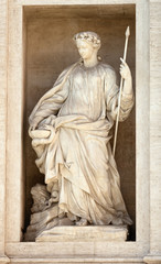 Fototapeta premium Statue of Health. Detail of the Trevi fountain in Rome, Italy