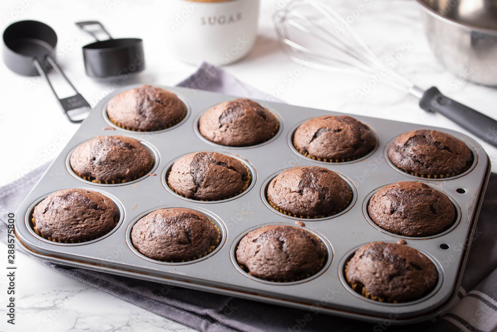 Sticker chocolate cupcake on iron pan