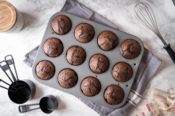 chocolate cupcake on iron pan - Powered by Adobe