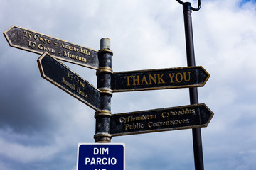 Writing note showing Thank You. Business concept for a polite expression used when acknowledging a...