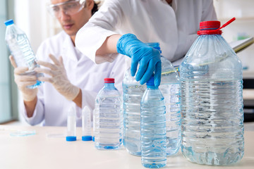 Two chemists working in the lab