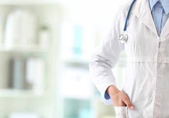 Female doctor with stethoscope in clinic