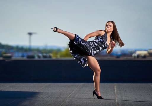 Tough Kickboxer Beauty In A Dress