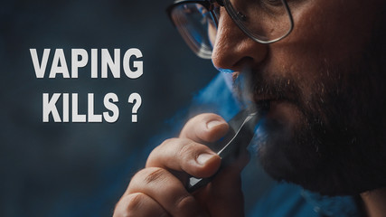 Caption - VAPING KILLS ? and man uses New Vape Pod device, exhales vapour