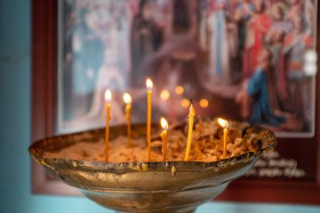 Candles in orthodox church - obrazy, fototapety, plakaty