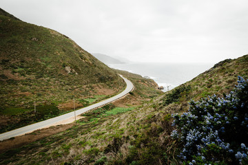 Fototapeta na wymiar Road running through the mountain along the coast