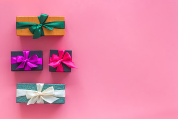 frame from boxes with presents on pink background top view mockup