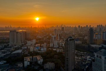 Naklejka na ściany i meble High Rise Buildings at Downtown in Bangkok Thailand in the evening.