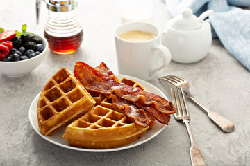 Breakfast plate with waffles and bacon