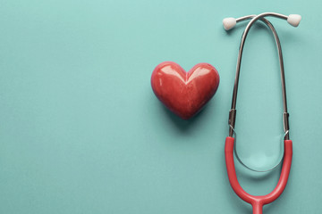 Red heart with stethoscope, heart health,  health insurance concept, World heart day, world health...