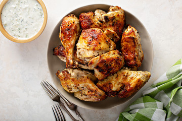 Roasted chicken with tzatziki sauce © fahrwasser
