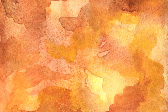 Watercolor autumn abstract background with brown, yellow and orange colors
