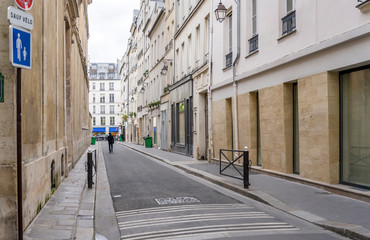 Desert narrow Parisian street with residential buildings
