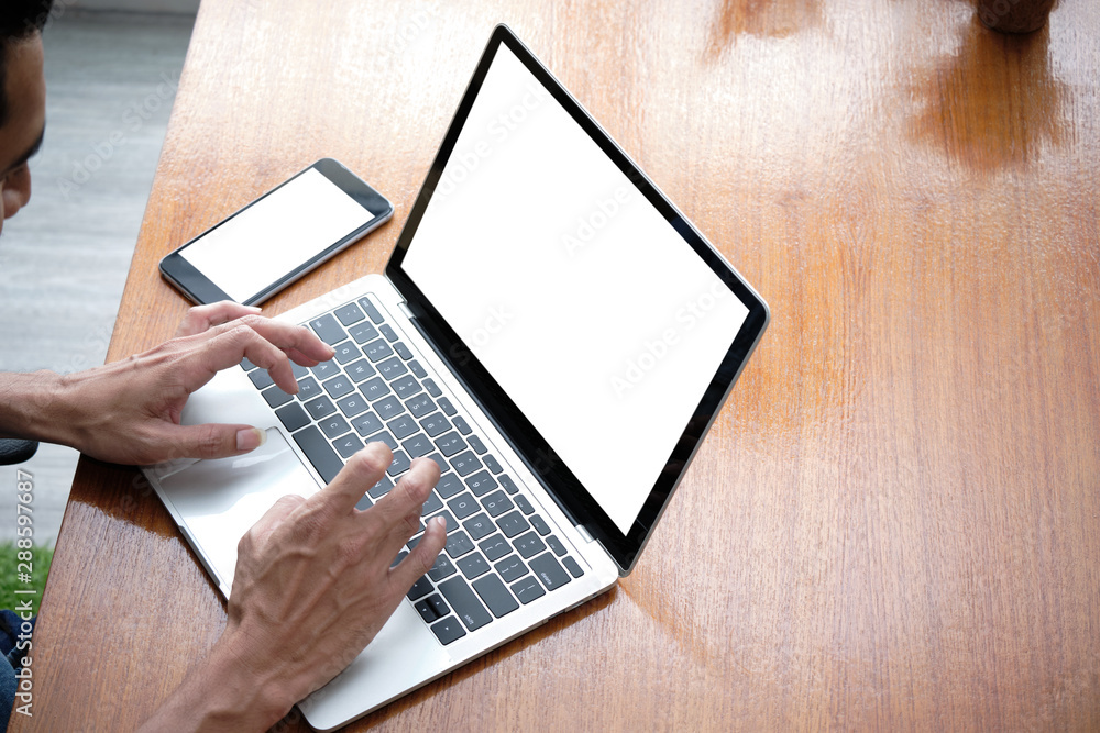 Fototapete hands of an online business entrepreneur is typing a keyboard on the laptop for checking order list 