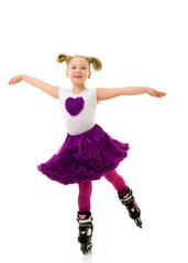 Little girl on roller skates.