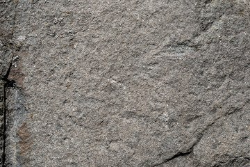 grey or gray background and texture stone of layers and cracks. Cliff of rock mountain.