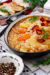 Thick vegetable soup with pasta