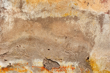 Texture of a concrete wall with cracks and scratches which can be used as a background